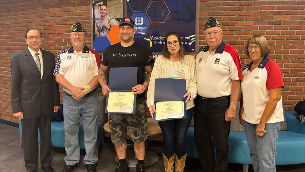 St. Clairsville American Legion Post #159 members present Belmont College students Justin Hall and Michele Johnston with the St. Clairsville American Legion Citizenship Scholarship.
